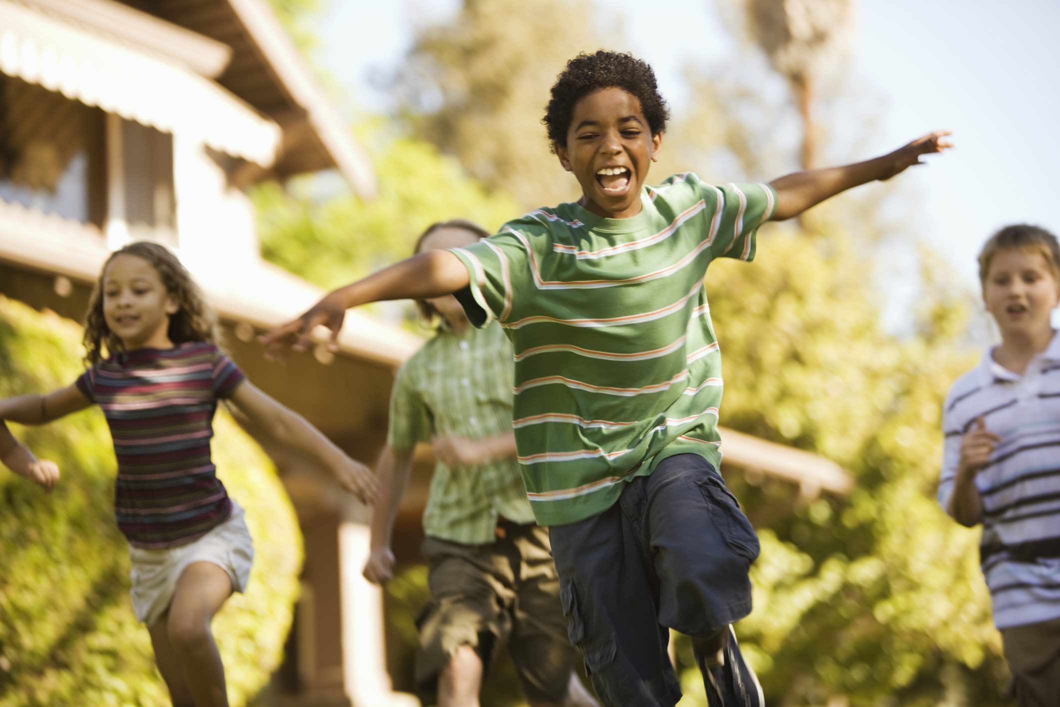 Children playing outdoors on a sunny day